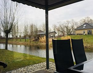 Uitzicht vanaf verandaterras van Huisje in Escharen, vakantiehuis in Noord Brabant.
