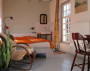 Comfortabele slaapkamer met veel licht in Vakantiehuis in Sambeek, Noordoost Brabant.