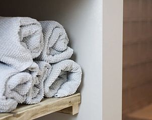 Frisse handdoeken in de badkamer van Vakantiehuis in Beers, Noordoost Brabant.