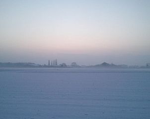 Sereen winterlandschap rondom Vakantiehuisje in Beugen, Noordoost Brabant, met een kalme en stille sfeer.