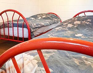 Sfeervolle slaapkamer met twee bedden in Vakantiehuisje in Vortum Mullem, Vortum-Mullem.