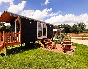 Charmant vakantiehuis Huisje in Ledeacker, Noordoost Brabant, met zonnig terras en groene omgeving, perfect voor ontspanning.