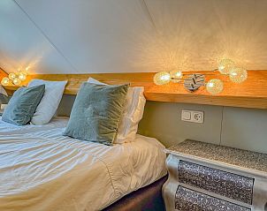 Knusse zolder slaapkamer in Villa de Argento vakantiehuis, Alphen, Noord Brabant.