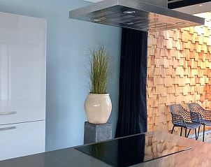 Elegante keukenhoek in Vakantiehuisje in Oosterhout, West Brabant, met toegang tot terras.