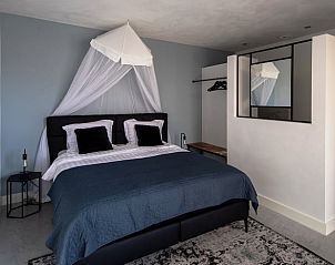 Comfortabele slaapkamer in Vakantiehuisje in Oosterhout, West Brabant, met luxe beddengoed.