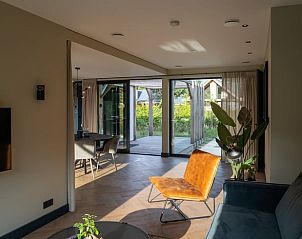 Sonniger Innenraum im Ferienhaus in Oosterhout, perfekt fr Entspannung in West-Brabant.