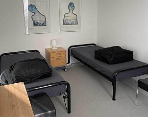 Tweede slaapkamer met eenpersoonsbedden in Veekehof vakantiehuis, Oosterhout, West Brabant.