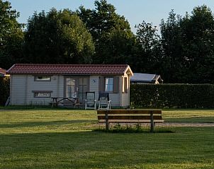 Vakantiehuisje in Drimmelen, een charmante vakantiewoning in West Brabant omgeven door groene natuur en rustgevende omgeving.