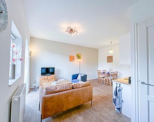 Gezellige binnenruimte van Koeienstal vakantiehuis in Drimmelen, met moderne inrichting.