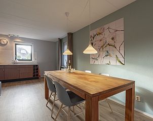 Gezellige eetruimte in Duynopgangh 46 Julianadorp aan Zee, vakantiehuis in Noord-Holland.