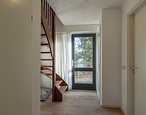 Slaapkamer met tweepersoonsbed in Duynopgangh 46 Julianadorp aan Zee, vakantiehuis.