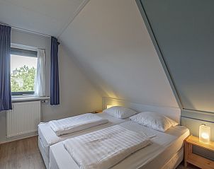 Moderne badkamer in Duynopgangh 46 Julianadorp aan Zee, vakantiehuis Noord-Holland.