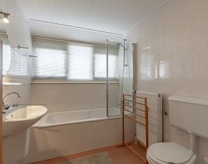 Zijtuin met tuinhuisje bij Duynopgangh 46 Julianadorp aan Zee, vakantiehuis.