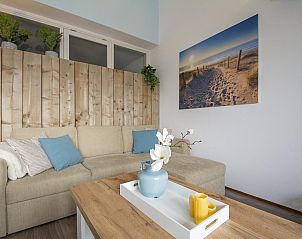 Gezellige woonkamer in Strandslag 215 Julianadorp aan zee, vakantiehuis in Julianadorp, Noord-Holland.