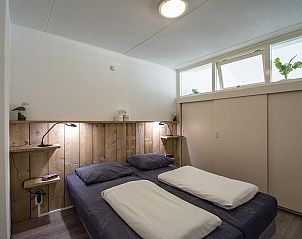 Knusse slaapkamer in Strandslag 215 Julianadorp aan zee, vakantiehuis in Julianadorp, Noord-Holland.