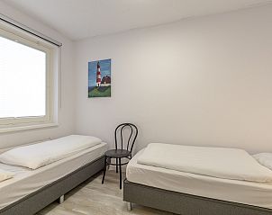 Tweepersoons slaapkamer in Strandslag 103 Julianadorp aan Zee, vakantiehuis Noord-Holland.