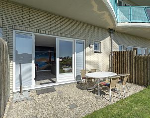 Privterras bij Strandslag 103 Julianadorp aan Zee, vakantiehuis aan de Noordzeekust, Noord-Holland.