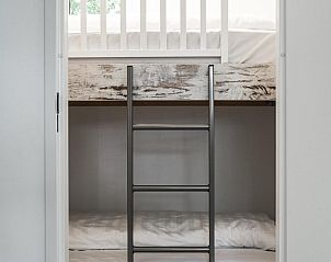 Kinderkamer met stapelbed in Strandhuisje 6 personen, Julianadorp, Noordzeekust, ideaal voor gezinnen.