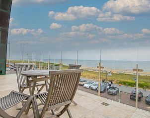 Geniet van het panoramisch uitzicht op zee vanaf het terras van vakantiehuis De Garnaal in Egmond aan Zee, Noord-Holland.