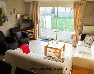 Gezellige woonkamer in Callantsoog de Seinpost nr 9, vakantiehuis aan de Noordzeekust, Noord-Holland.
