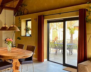 Cozy dining room in Holiday home in Callantsoog on the North Sea coast in North Holland.