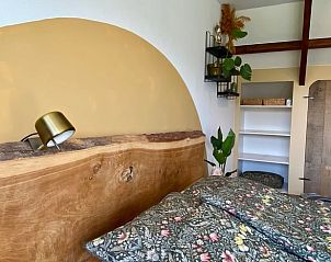 Cozy bedroom in Holiday home in Callantsoog, North Sea coast, North Holland.