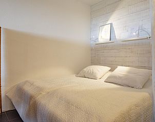 Bedroom with double bed in Callantsduyne 33 Groote Keeten, vacation home in Callantsoog, North Holland.