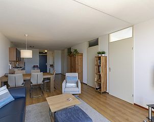 Modern living room in Duinerei C002 Groote Keeten vacation home in Callantsoog, North Sea coast, North Holland.