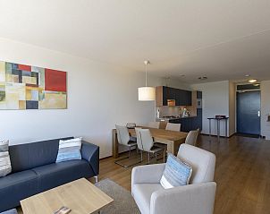 Spacious dining room in Duinerei C002 Groote Keeten vacation home in Callantsoog, North Sea coast, North Holland.