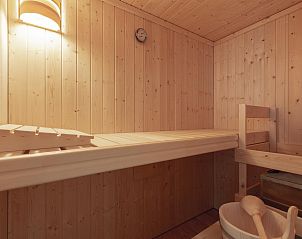 Spacious terrace at Duinerei C002 Groote Keeten vacation home in Callantsoog, North Sea coast, North Holland.