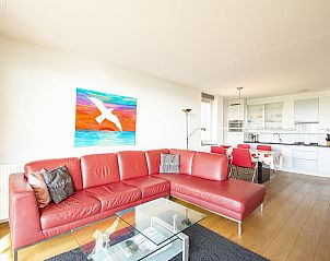 Open kitchen and dining area in Duinerei C103 Groote Keeten vacation home in Callantsoog, North Holland.