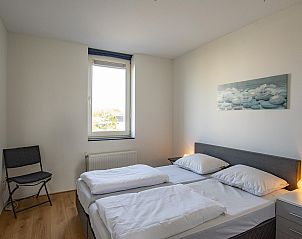 Comfortable bedroom in Duinerei C103 Groote Keeten vacation home in Callantsoog, North Holland.