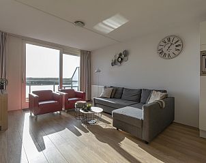 Modern living room with lots of light in Duinerei C202 Groote Keeten, vacation accommodation in Callantsoog, North Sea coast.
