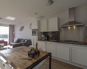 Cozy bedroom with view in Duinerei C202 Groote Keeten, vacation home in Callantsoog, North Sea coast.