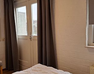 Guest house 4504150 - Holiday property Noordzeekust - Vakantiehuis Ferienbungalow Abbes mit Garten und Terrasse