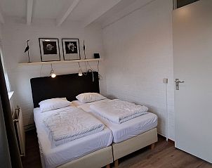 Guest house 4504150 - Holiday property Noordzeekust - Vakantiehuis Ferienbungalow Abbes mit Garten und Terrasse