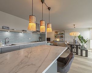 Modern kitchen of Strandleven 006 Groote Keeten, vacation home in Callantsoog, North Holland.