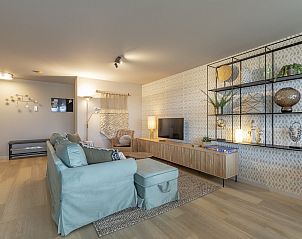 Comfortable sitting area in Strandleven 006 Groote Keeten, Callantsoog, with stylish decoration.