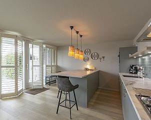 Kitchen with marble countertop in Beach Life 006 Groote Keeten, Callantsoog, on the North Sea coast.