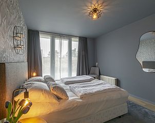 Luxury bedroom in Strandleven 006 Groote Keeten, vacation home in Callantsoog, North Holland.