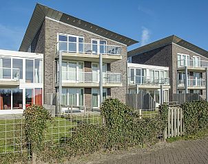Front facade of Strandleven 103 Groote Keeten vacation home in Callantsoog, North Sea coast, North Holland.