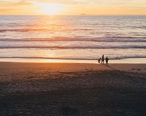 Sunset on the North Sea coast at Strandleven 103 Groote Keeten vacation home in Callantsoog.