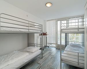 Schlafzimmer mit Etagenbett in Strandleven 106 Groote Keeten, Ferienhaus an der Nordseekste.