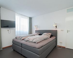 Cozy bedroom in Suite Duinzicht Callantsoog, ideal for a good night's sleep, North Sea coast, North Holland.