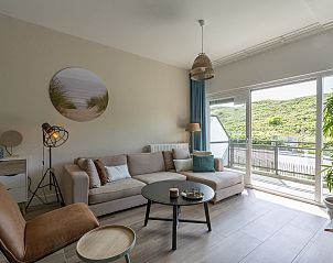 Comfortable sitting area in Wijde Blick 112 Callantsoog, vacation home on the North Sea coast, North Holland.