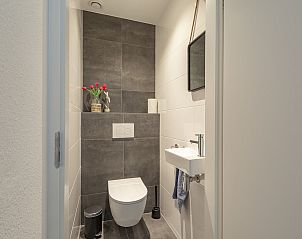Stylish toilet in Wijde Blick 112 Callantsoog, vacation home on the North Sea coast, North Holland.