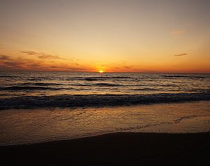 Breathtaking sunset at Wijde Blick 112 Callantsoog, vacation home on the North Sea coast.