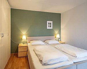 Cozy bedroom in Wijde Blick 203, vacation home in Callantsoog, North Holland.