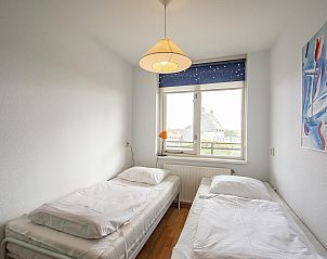 Second bedroom with two beds in Wijde Blick 203, vacation home in Callantsoog, North Holland.