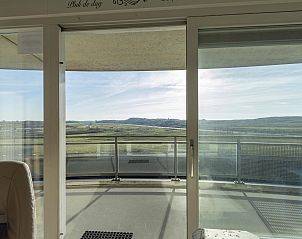 Spacious balcony of Wijde Blick 205 Callantsoog with breathtaking views of the nature of North Holland.